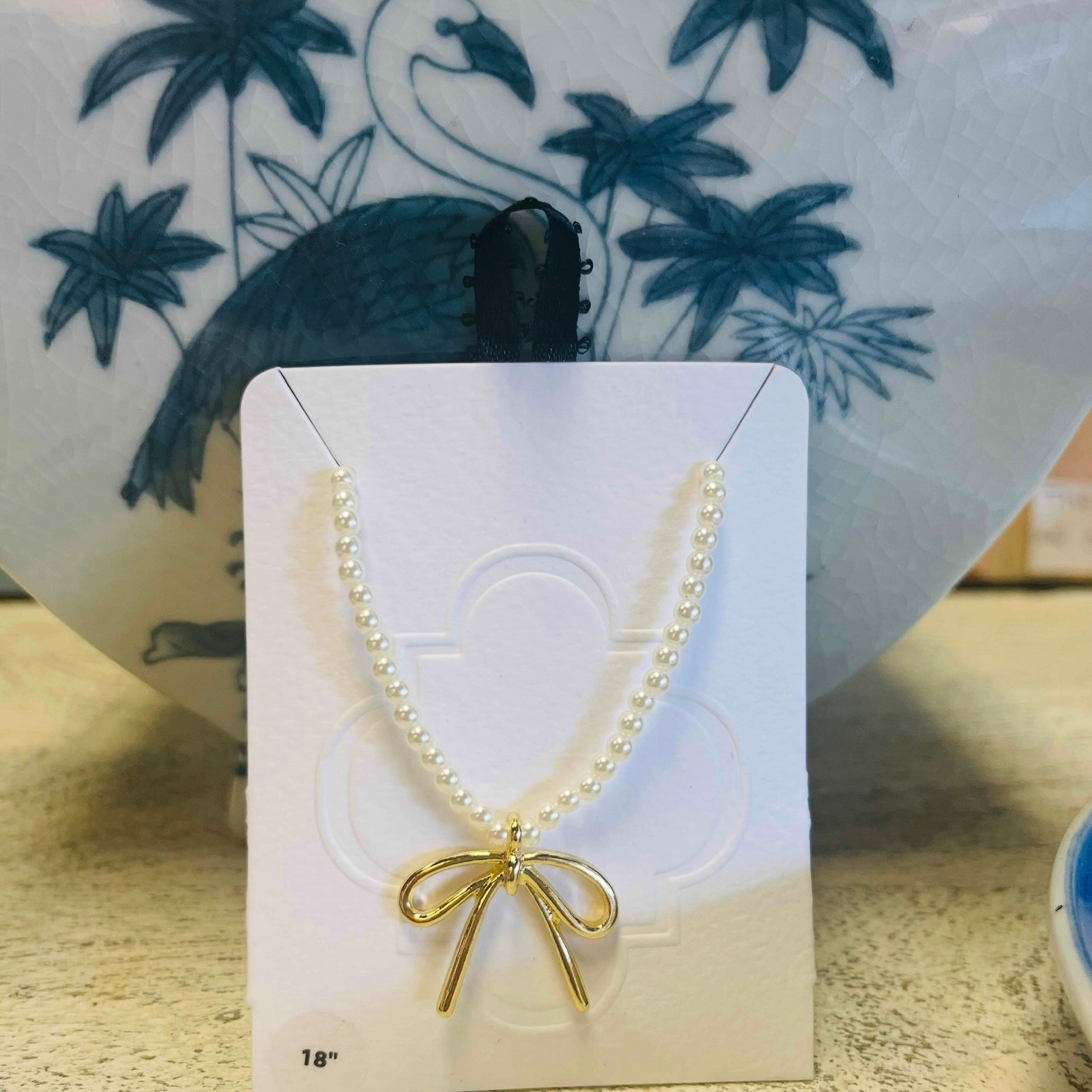 Wrap it Up Bow Pearl Necklace